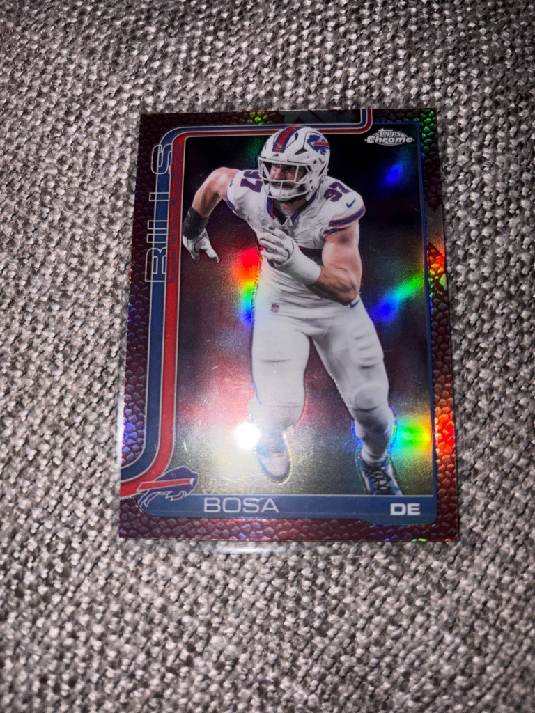 Joey Bosa (Note: The card features Joey Bosa in a digitally altered or mistaken Buffalo Bills uniform, an interesting design or print anomaly as he is famously known as a star pass rusher for the San Diego/Los Angeles Chargers and later San Francisco 49ers, though this specific card design or custom/error nature places him in Bills gear)