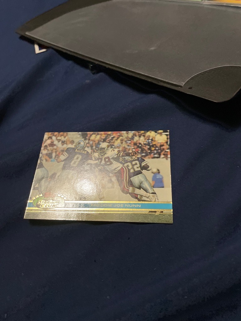 Freddie Joe Nunn (featuring Troy Aikman and Emmitt Smith in photo)