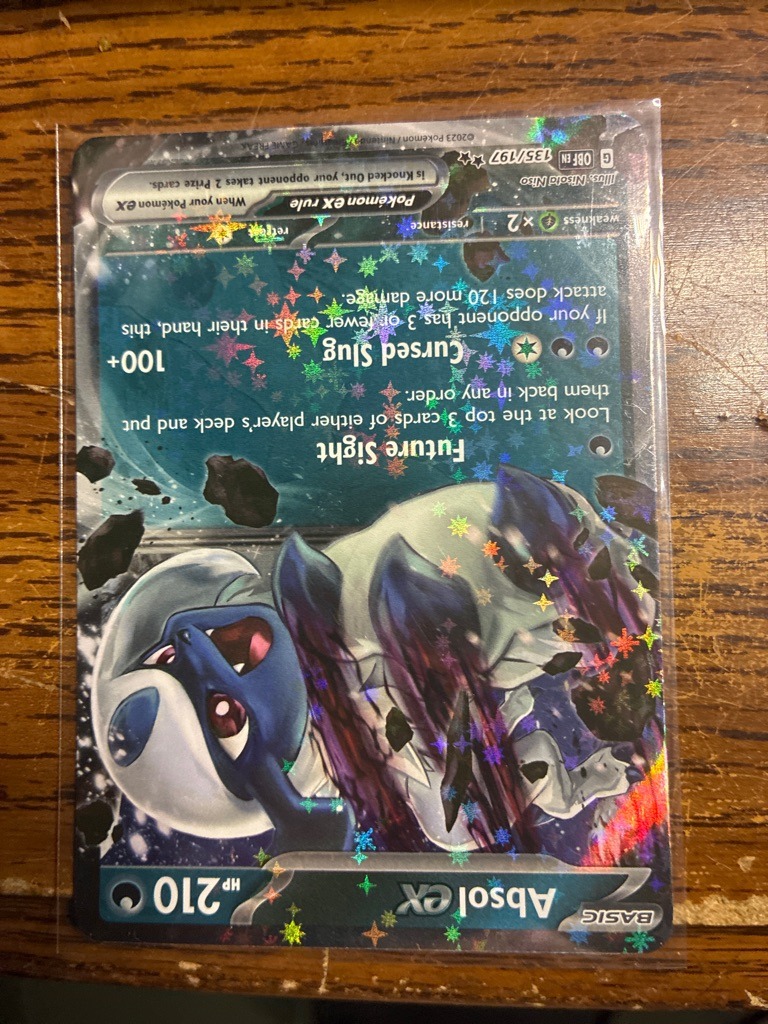 Absol (Note: This is a Pokémon trading card, not a football card; Absol is a fictional creature from the Pokémon franchise, not a football player)