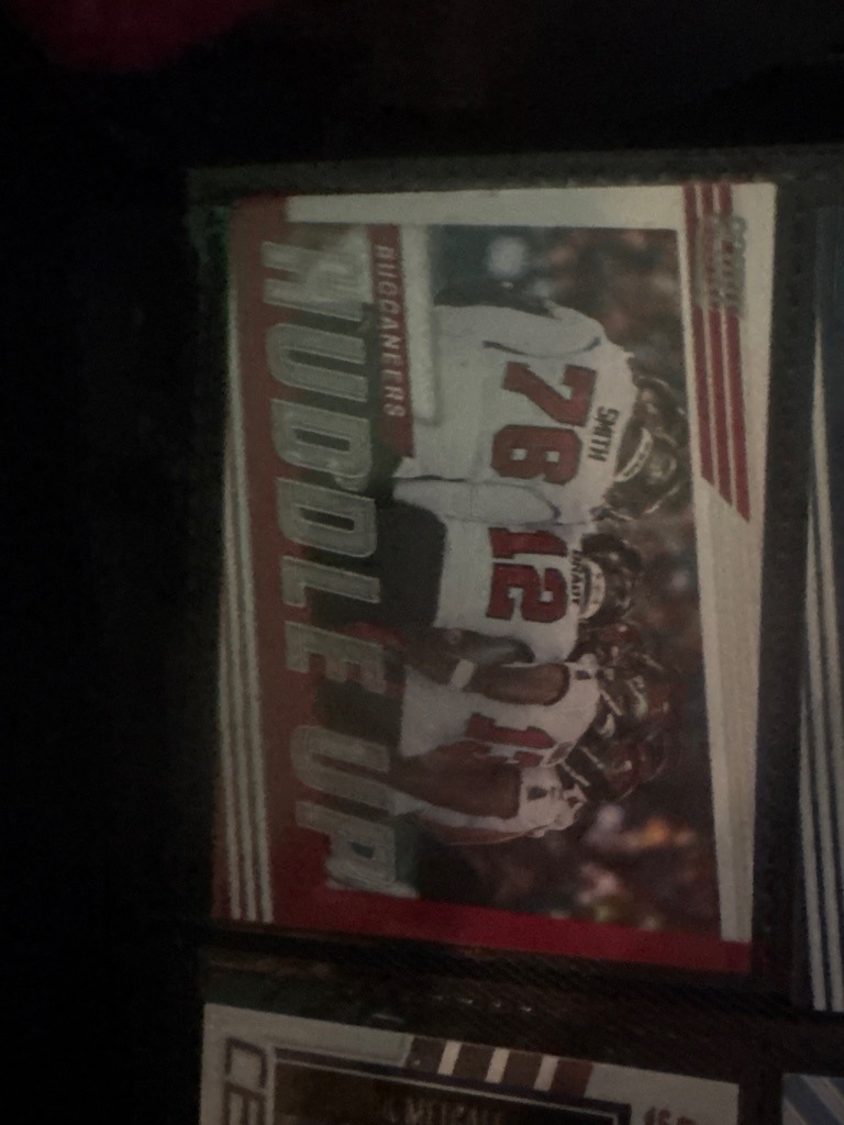 Tom Brady (featured with Donovan Smith and teammates)
