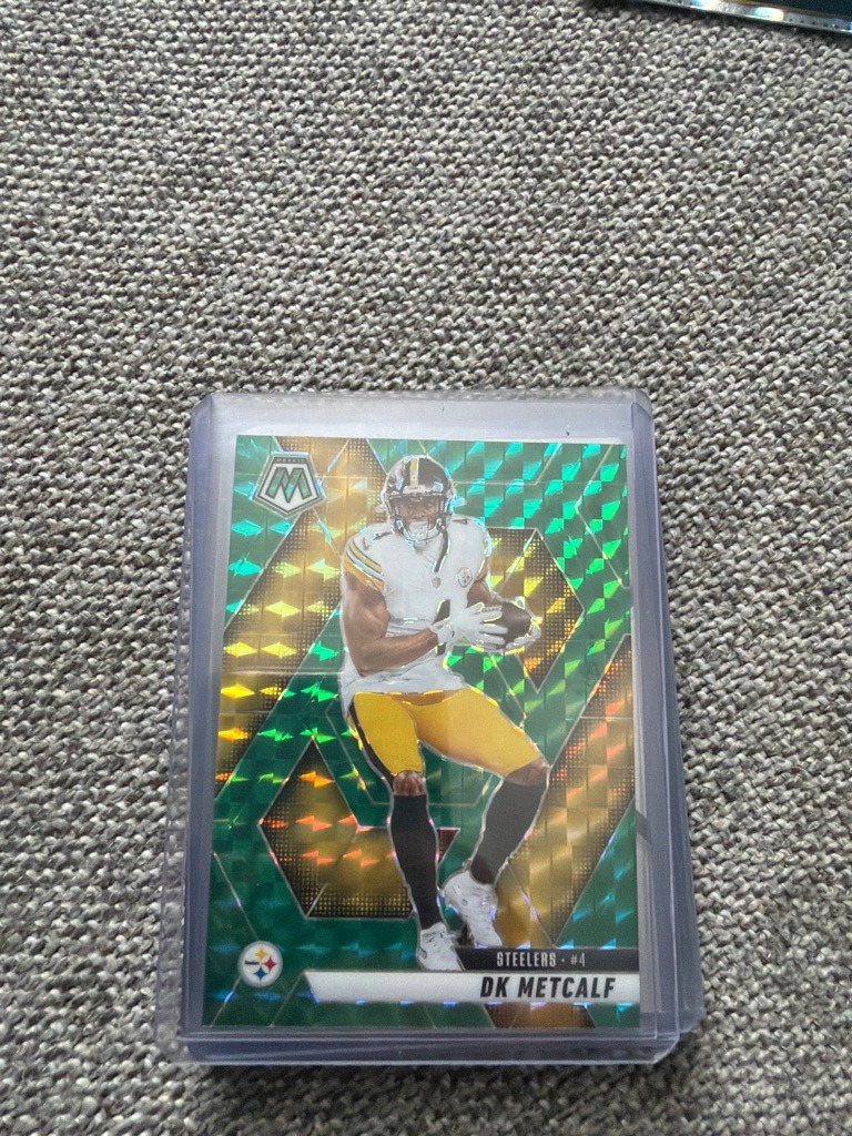DK Metcalf (Note: The card features an erroneous mockup/mismatch showing DK Metcalf in a Pittsburgh Steelers uniform, while Metcalf actually plays for the Seattle Seahawks. This is a well-known error or customized/mockup card phenomenon sometimes seen in unlicensed or custom productions, or a digital mockup error)