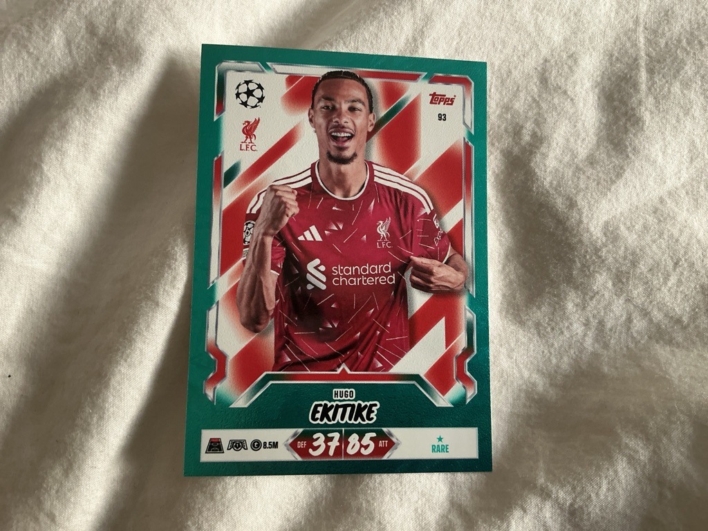 Hugo Ekitike (Note: The card actually features soccer player Hugo Ekitike in a Liverpool kit, though this prompt requests a football/soccer card analysis following the provided schema)
