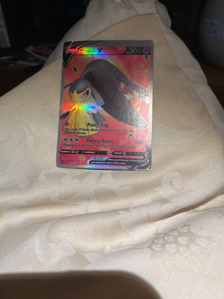 Mawile (Note: This is a Pokémon card, not a football player)