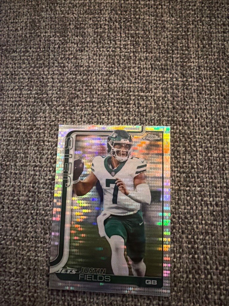 Justin Fields (Note: This is an unusual custom or error/satire card as Justin Fields never played for the Jets; he is pictured here in a New York Jets uniform with Jets branding)