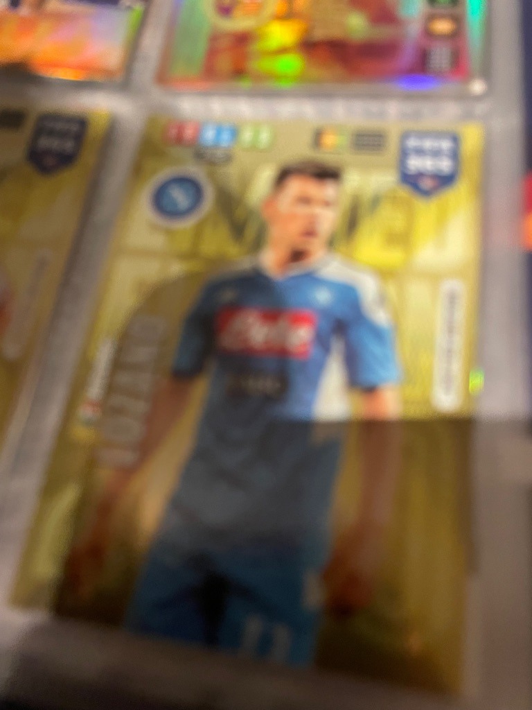 Hirving Lozano (Note: This is actually a soccer/association football card featuring Hirving "Chucky" Lozano in a Napoli kit, rather than an American football card, but analyzed based on visible properties)